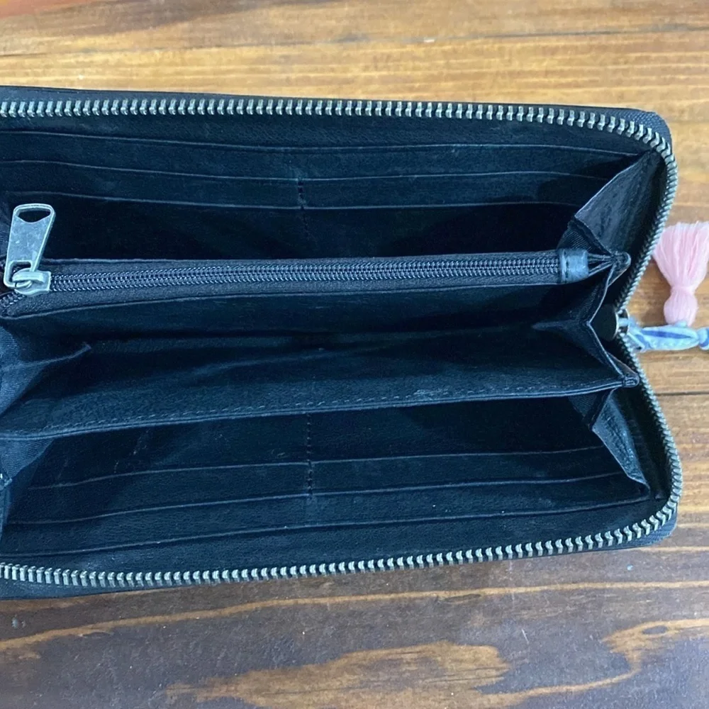Liebeskind leather wallet full zipper closure tassel pull neutral black minimal